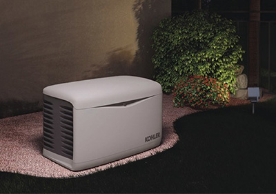 a Kohler backup generator in a homeowners yard