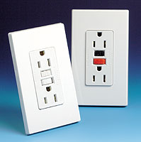 Two electrical outlets on blue background